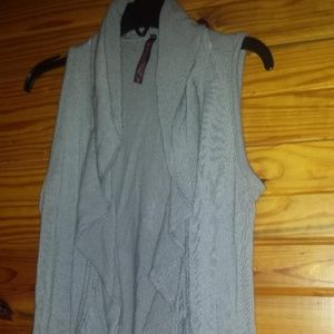 small gray sleeveless open front overlay top